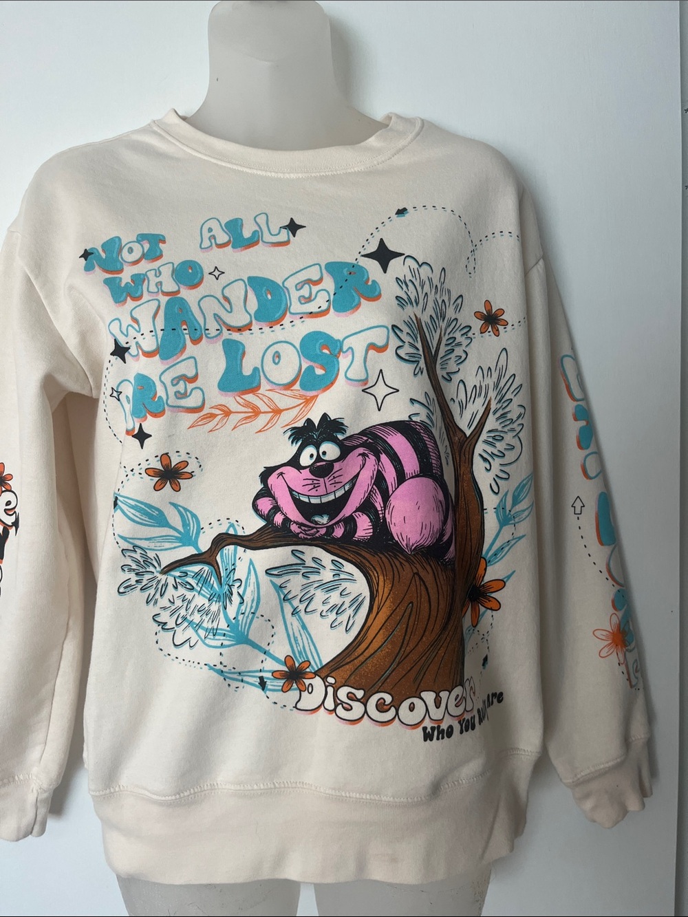 Disney Cream Cheshire Cat Crewneck Sweatshirt with Pink & Teal Graphic XS